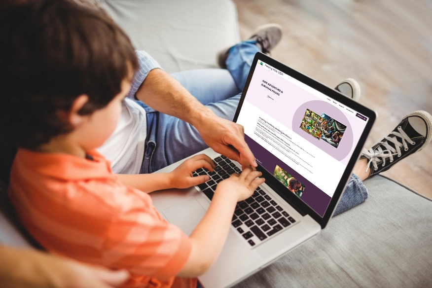 Father and son visiting helping kids usa on laptop