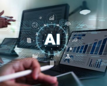 AI graphic with laptop tracking SEO in background